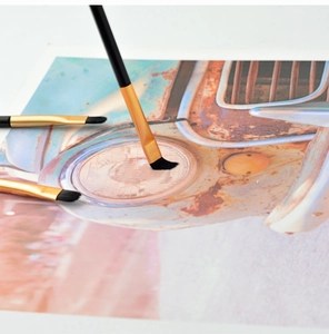 Detailed close-up of double-ended eyeshadow brushes and synthetic bristles for DIY painting