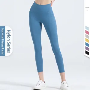 Himmelblaue Yoga-Leggings mit hoher Taille und Seitentaschen aus elastischem Nylon