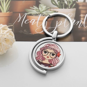 Sublimation metal keychain with rotating round pendant featuring a cartoon girl illustration