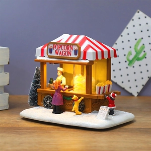 Christmas musical popcorn wagon village scene with LED light and miniature figurines