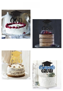 Detail of glitter Congrats Grad cake toppers with graduation cap design in multiple colors