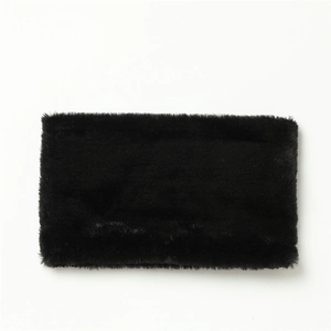 Close-up of soft black faux rabbit fur neck warmer showing fluffy texture and plush finish