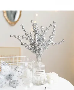 Close-up of sparkling silver glitter berry picks for Christmas tree floral decoration