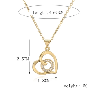 Detail view of interlocking heart necklace with size dimensions 2.5cm by 1.8cm