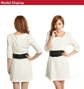 Front and back view of a white crewneck dress with a wide black leather waist belt