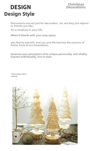 Close-up of amber glass Christmas tree ornament with warm LED light and textured finish