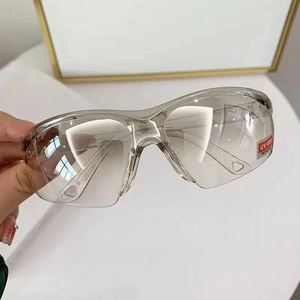 Grey wrap-around cycling sunglasses with UV400 protection for sports and outdoor use