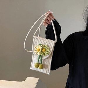 Chic woven floral phone bag in cream with yellow flowers for summer beach vacations