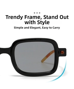 Close-up of square black sunglasses featuring amber temples and orange bead details