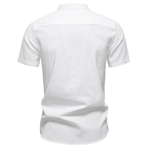Back view of white short-sleeve linen shirt showing premium cotton texture and stitching