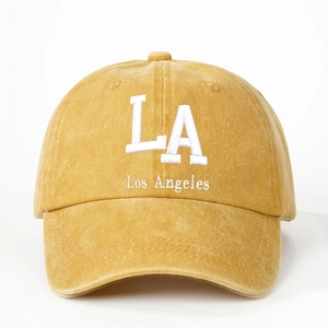 Adjustable mustard yellow washed cotton baseball cap with white LA embroidery