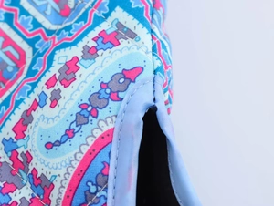 Close-up of ethnic geometric pattern printing and high-quality edge stitching on cotton vest