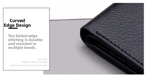 Close-up of durable black lychee grain leather wallet with reinforced curved edge stitching