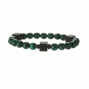 Malachite and black volcanic stone beaded bracelet with natural stone texture on white back