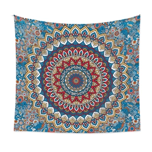 Colorful Bohemian mandala tapestry with intricate blue and red floral geometric patterns