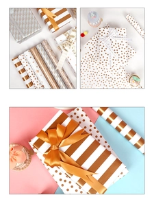 Detail of rose gold and silver gift wrap rolls with elegant stripes and polka dots pattern