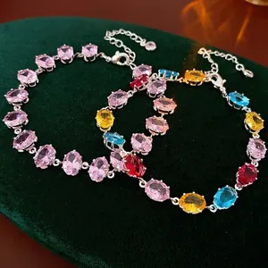 Elegant silver bracelet featuring oval-cut multicolored zircons with lobster clasp closure