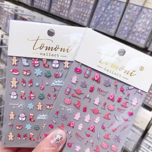 Detail view of 3D embossed holiday nail art stickers with Christmas and Halloween motifs