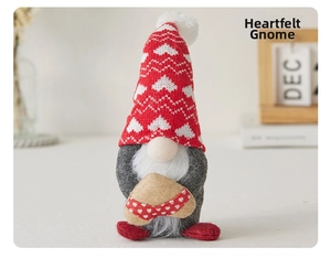 Close-up of festive male gnome doll with heart jacquard hat and plush beard decor