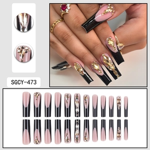 Extra-long black French coffin press-on nails with sparkling rhinestones and gems