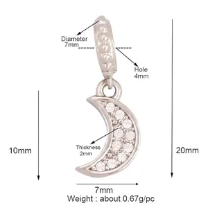 Macro detail of crescent moon pendant with white zircons and measurements