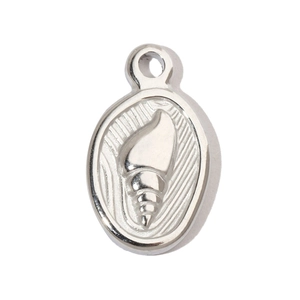 Detailed macro view of an oval silver stainless steel pendant with embossed seashell design