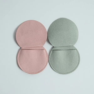 Pink and sage green microfiber envelope jewelry pouches in premium suede finish