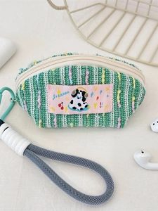 Housse d'écouteurs en tweed vert avec patch dalmatien rose et dragonne de rangement