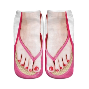Macro detail of 3D printed socks featuring pink flip-flops and red painted toenails