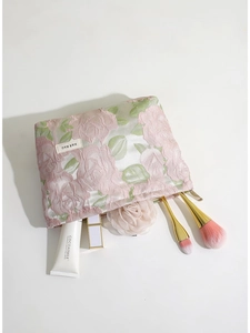 Trousse de maquillage en jacquard rose à fleurs avec fermeture éclair et logo de marque