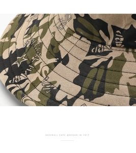 Detail showing high-quality camouflage fabric texture and reinforced stitching on outdoor sun hat