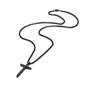 Detail view of a matte black stainless steel cross pendant with a sturdy box chain