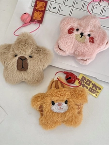 Star plush pendants with bear embroidery in pink and brown, featuring bells and tags