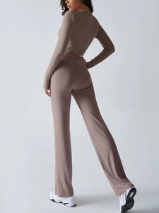 Rear view of brown Y2K tracksuit featuring slim long sleeve top and flared pants