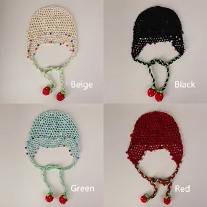 Hollow knit beanie hats in four colors with colorful beads and strawberry pendants