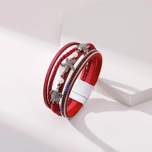 Red multi-layer bohemian bracelet with silver turtle and starfish charms on stones
