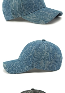Close-up of jacquard denim fabric texture and fine stitching on the baseball cap