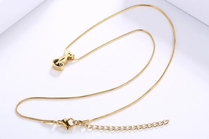 Detailed view of golden cat pendant necklace with adjustable chain and lobster clasp