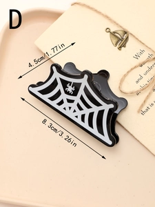 Detail of spider web pattern hair claw clip with dimensions 8.3cm and 3.26in size markers