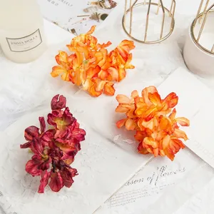 Artificial hydrangea flowers in orange and burgundy for DIY crafts and home decor