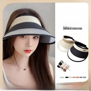 Detail of breathable sun visor hat showing contrast color design and foldable fabric