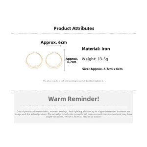 Detailed size and material specs for layered circle pendant earrings in gold finish