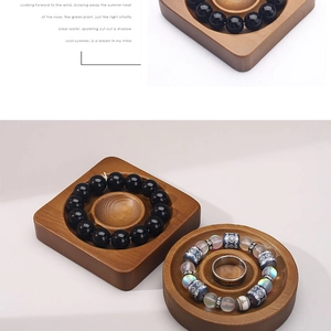 Top-down view of solid wood jewelry display tray showing natural grain for beads and bracelets