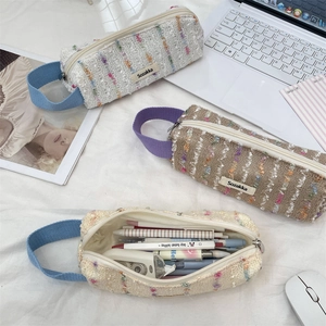 Floral knit pencil pouch with vertical stripes and sturdy handle for students