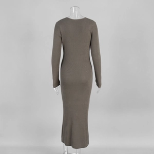 Detail of taupe ribbed knit dress showing the textured vertical ribbing and bodycon fit