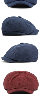 Detailed close-up of herringbone weave pattern on blue and red newsboy octagonal caps