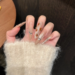Cat eye press-on nails with leopard print, silver glitter gradient and 3D metallic lines