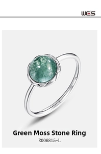 Macro shot of natural green moss agate ring with polished silver S925 band and round gemstone