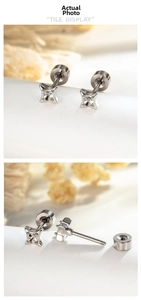 Macro detail of silver four-pointed star screw-back earring components for DIY sets
