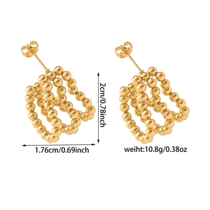 Detailed view of square gold stud earrings with dimensions 2cm by 1.76cm and 10.8g weight